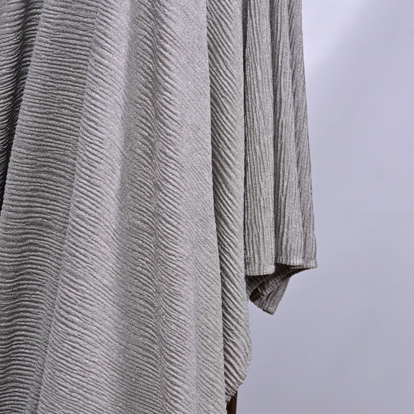 Hijabistic showcasing Grey (Charcoal) Tallin Kashmir hijab Side View, Shop hijabs online
