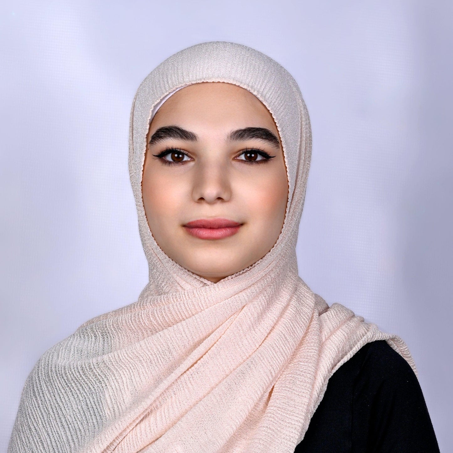 Hijabistic Model showcasing Pink (Blush) Tallin Kashmir hijab Front View, Shop hijabs online