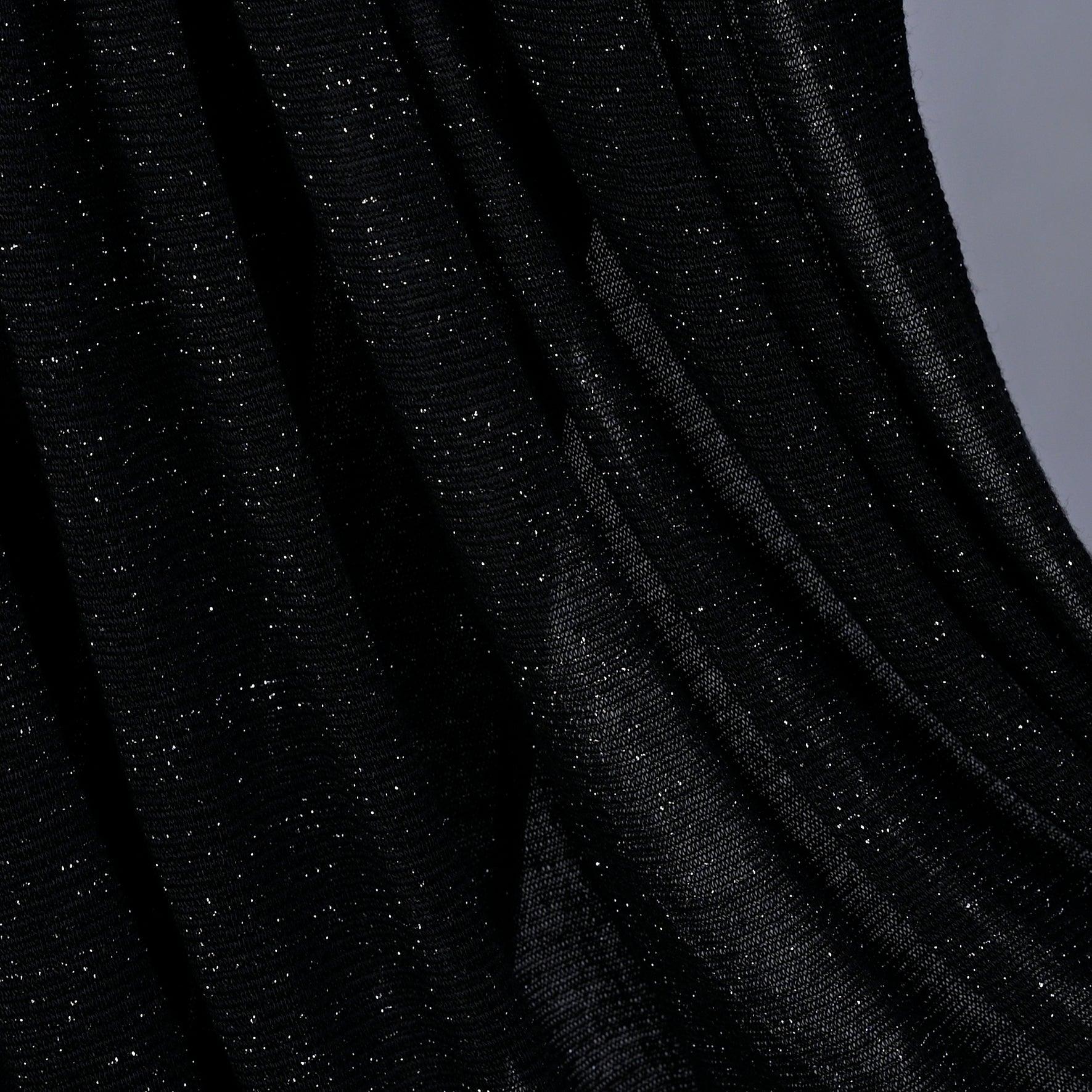 Close-up of Hijabistic’s Klara Shawl in Woodsmoke Black - highlighting the luxurious texture and dark hue.