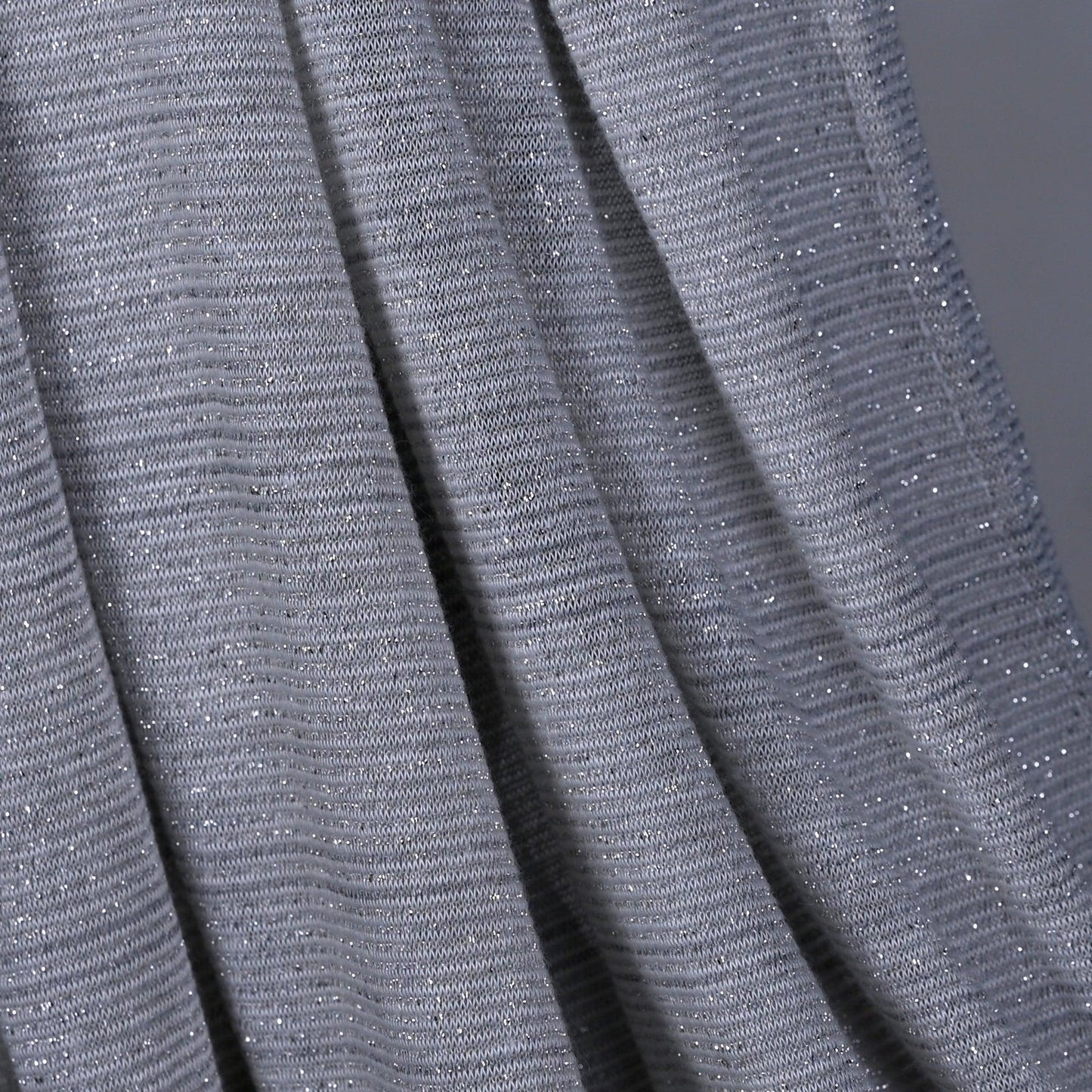 Close-up of Hijabistic’s Klara Shawl in Shuttle Gray - detailing the fine Cotton Lycra Lamé texture.