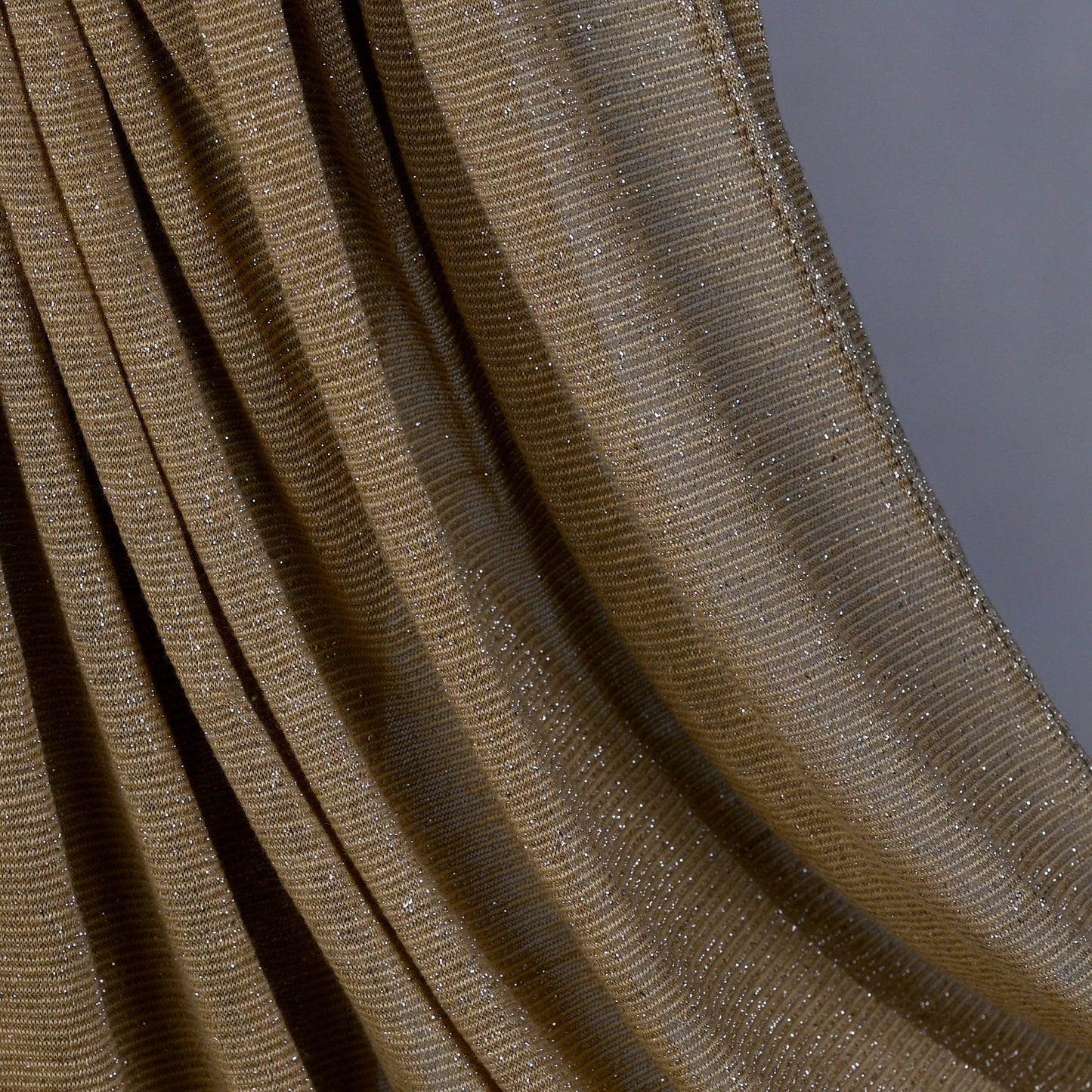 Close-up of Hijabistic’s Klara Shawl in Sand Dune Brown - detailing the smooth, soft fabric texture.