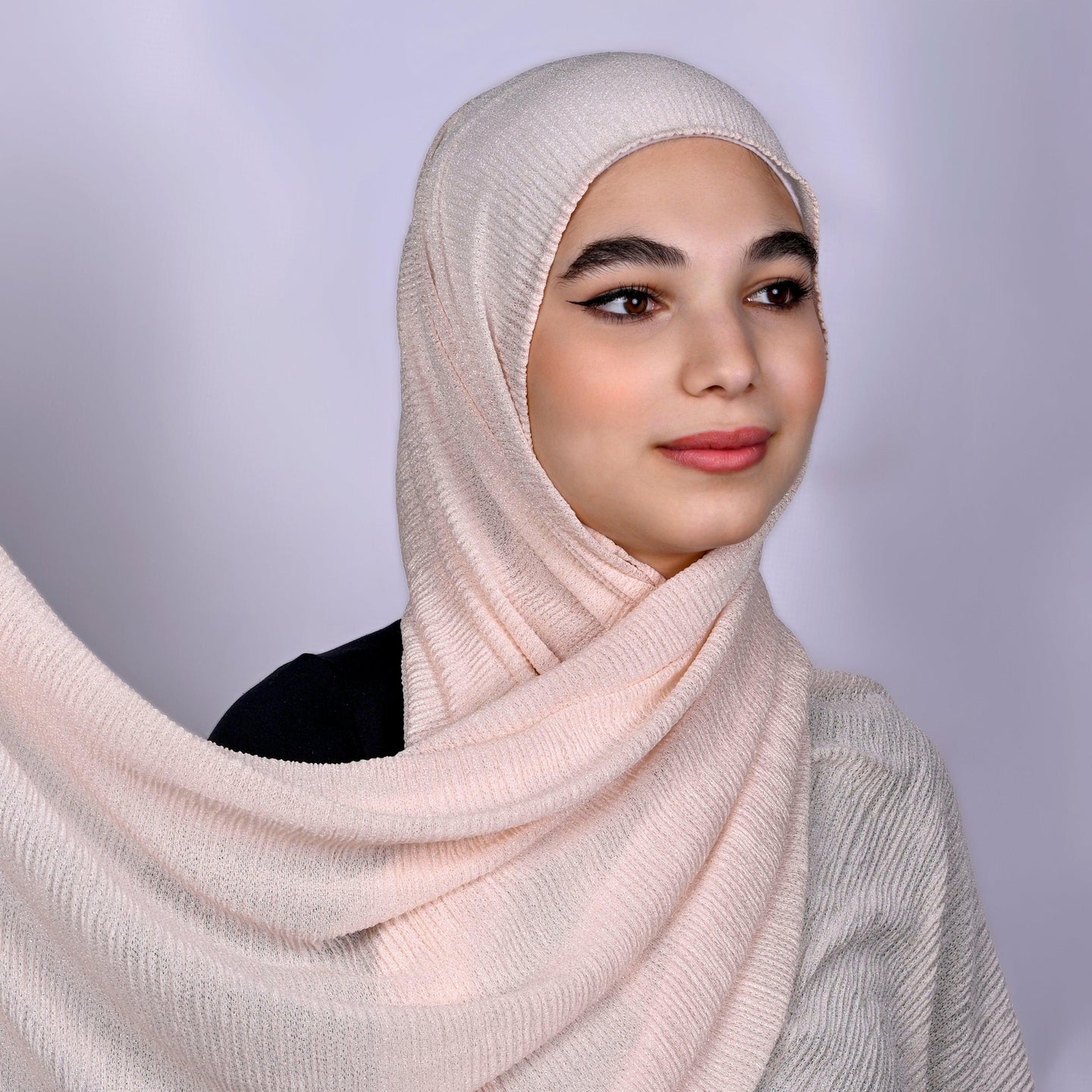 Hijabistic Model showcasing Pink (Blush) Tallin Kashmir hijab Side View, Shop hijabs online