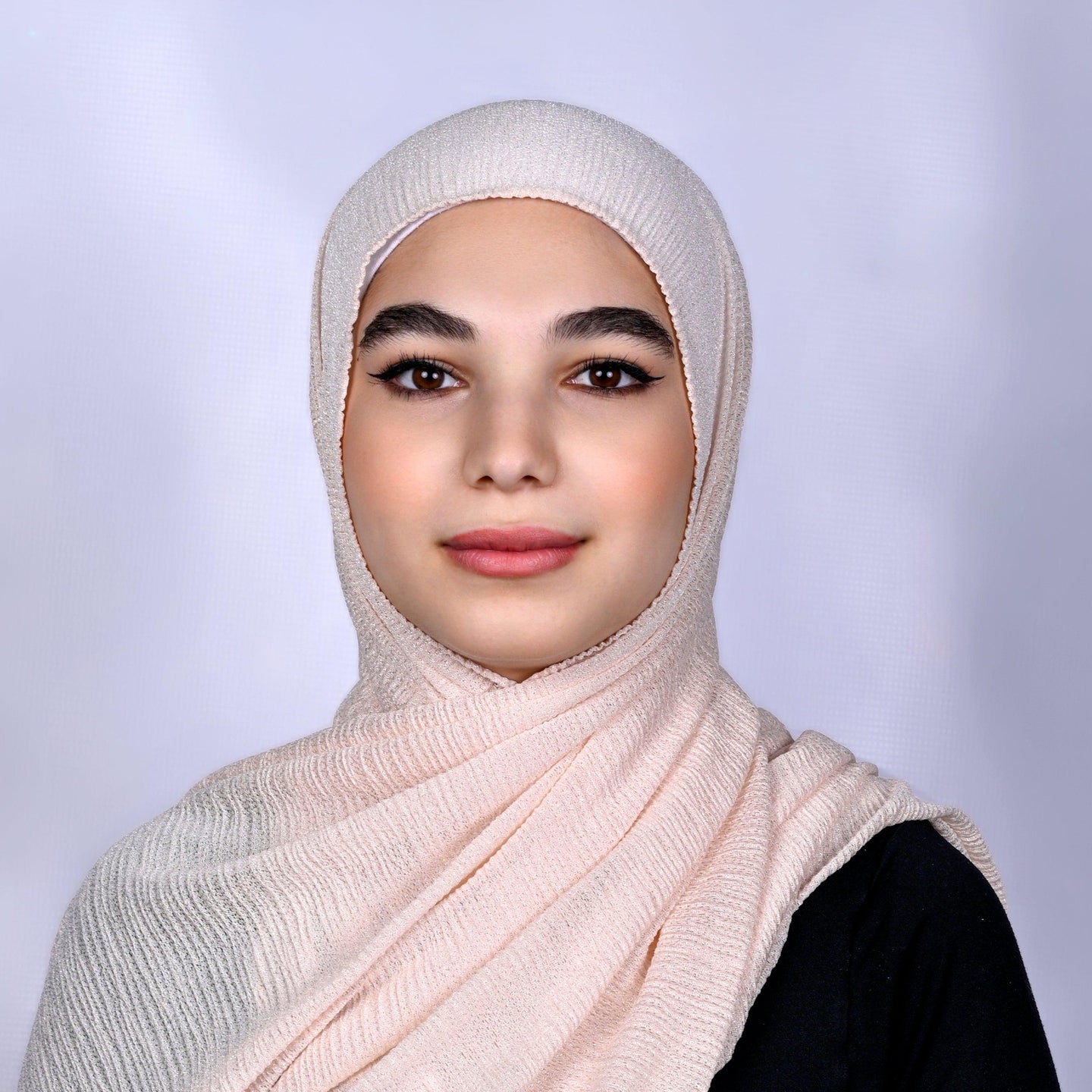 Hijabistic Model showcasing Pink (Blush) Tallin Kashmir hijab Front View, Shop hijabs online