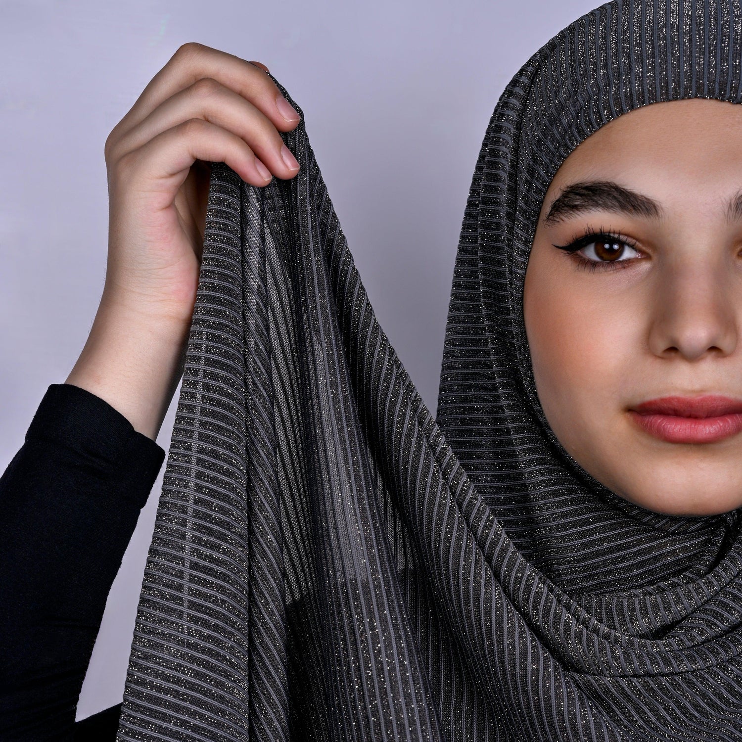 Hijabistic model showcasing black hijab