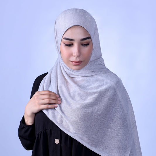 Front view of Hijabistic’s Klara Shawl in Shuttle Gray - elegant Cotton Lycra Lamé hijab with a matte finish.